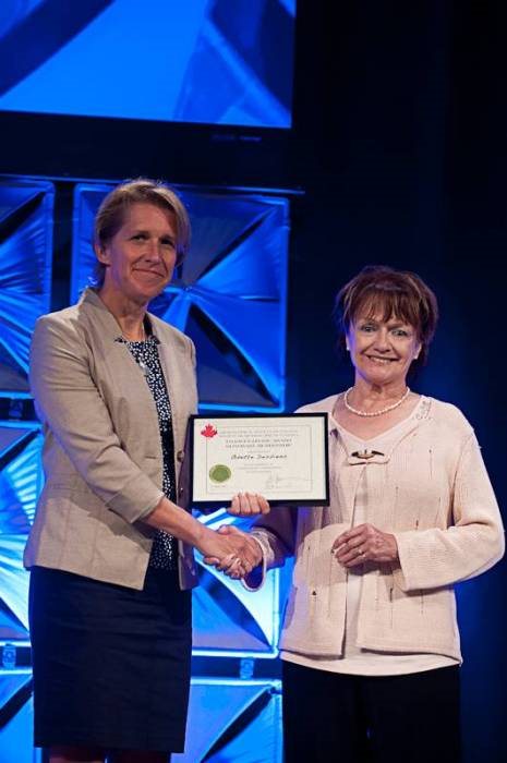 O. Desbiens receiving Frances Doane award.